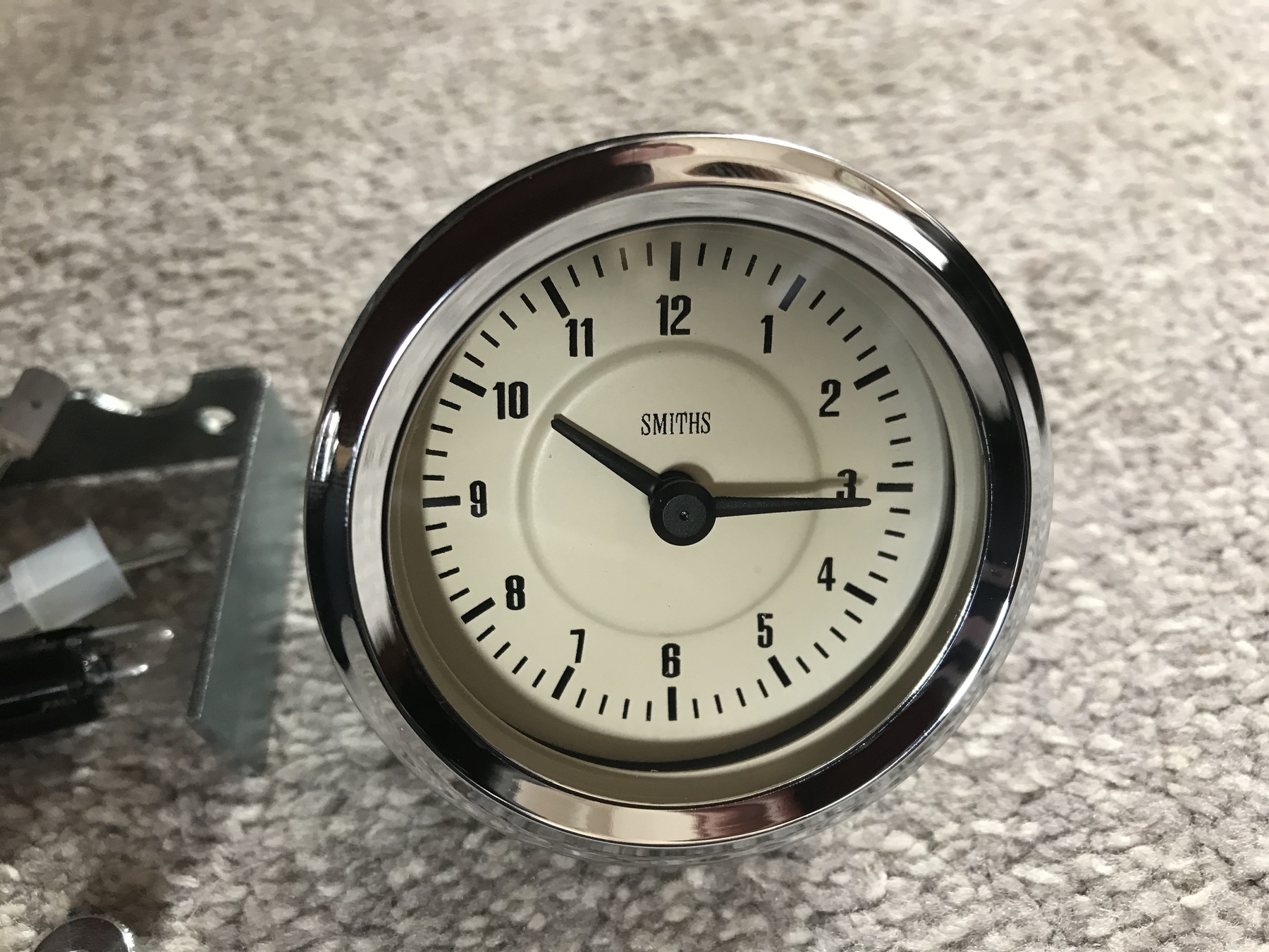 Photo of a repaired Smiths classic car time clock