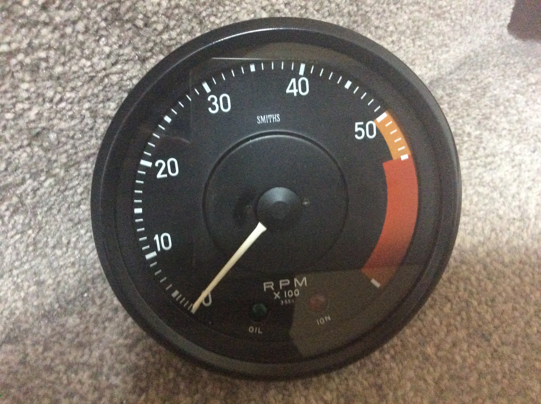 Image of a classic car revcounter repair